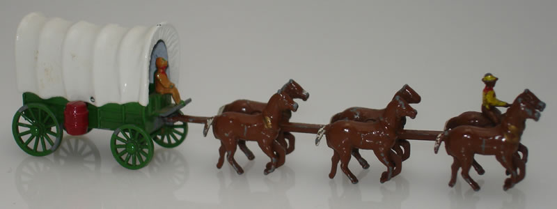Covered Wagon with red barrels